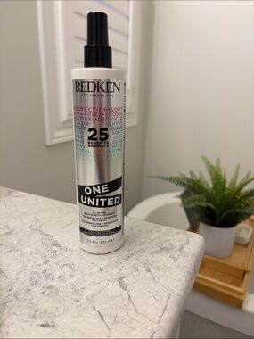 Redken One United Multi-Benefit Spray — White with Black Cap